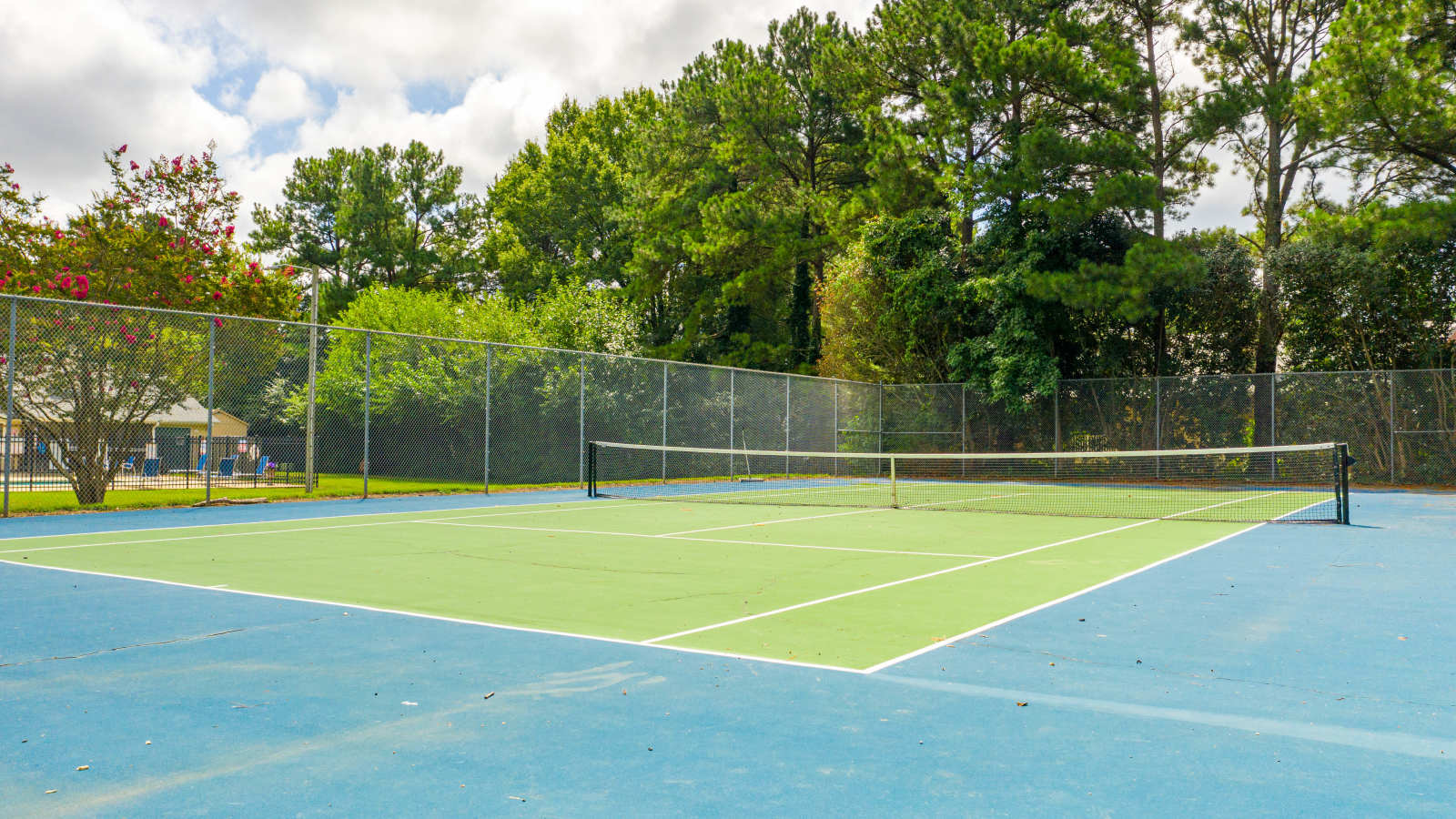 Tennis court at Bryan Woods Apartments